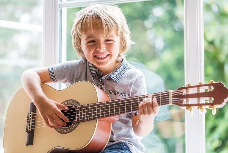 Kid-Playing-Guitar